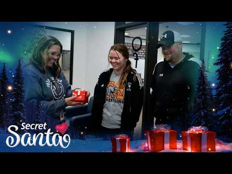 Husband, wife and daughter are called to the school office for surprise from a Secret Santa